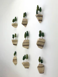 Nature sculpture by Ryan Weiss of Loamworks | Your Very Own Private Island made of wood, twig, fiber, magnet