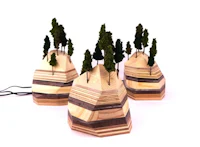 Nature sculpture by Ryan Weiss of Loamworks | Magic Mountain Lamp made of wood, acrylic, twigs, fiber and LED lights